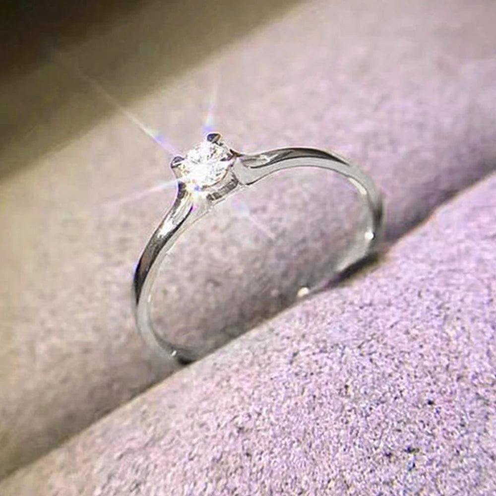 Huitan Minimalist Women's Wedding Rings with 4MM Cubic Zirconia Simple Elegant Female